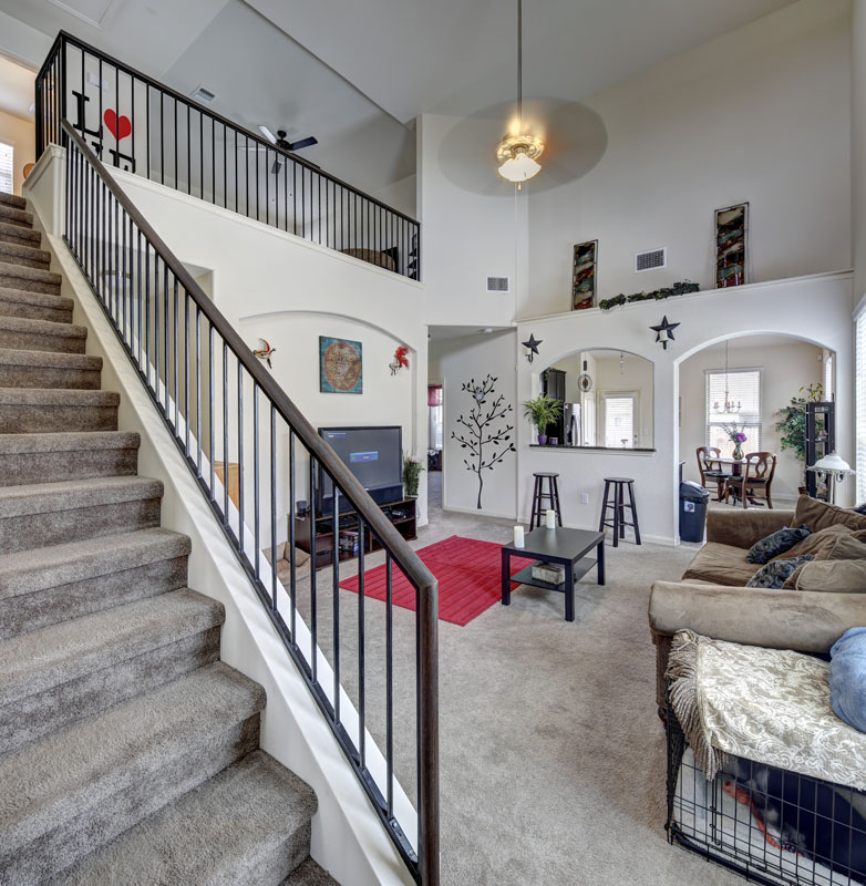 Real Estate architectural photography of vaulted ceiling living room