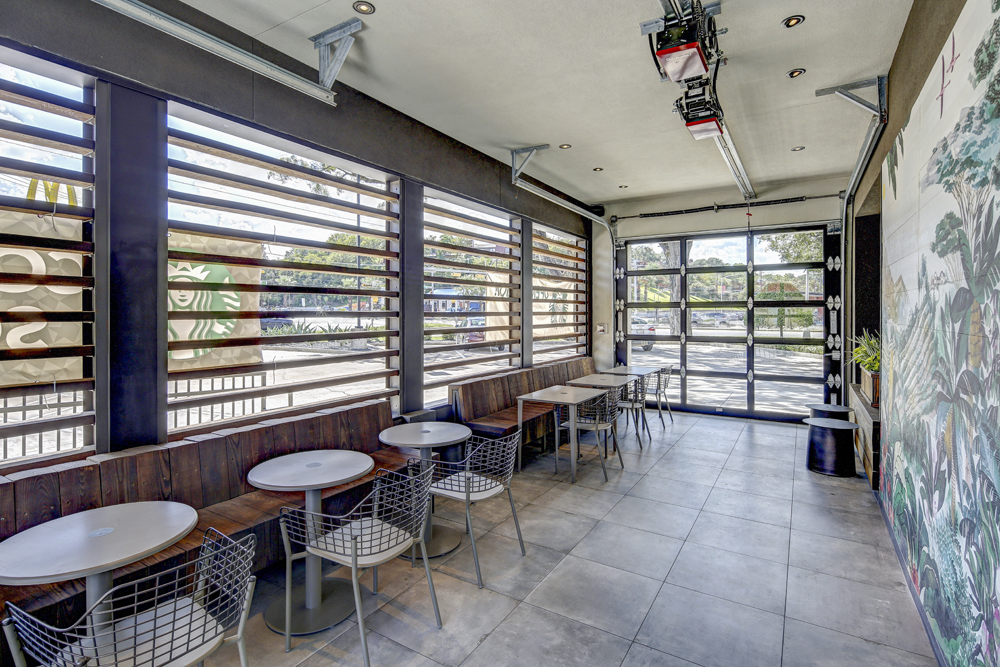 Arm-R-Lite door installation at new Starbucks interior