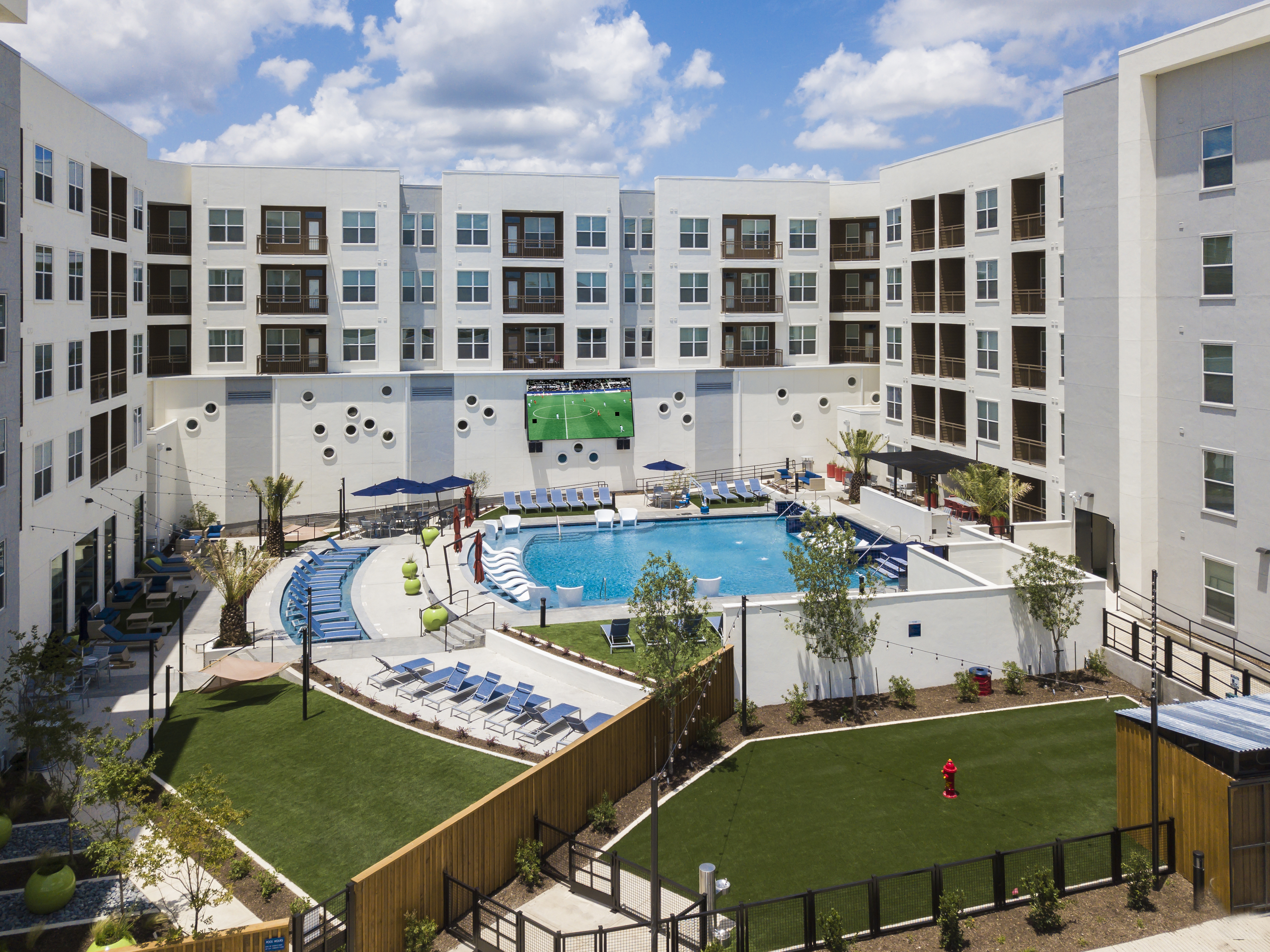 Pool Exterior and Jumbotron at The Lyndon Architectural photography in San Marcos by Johnny Stevens