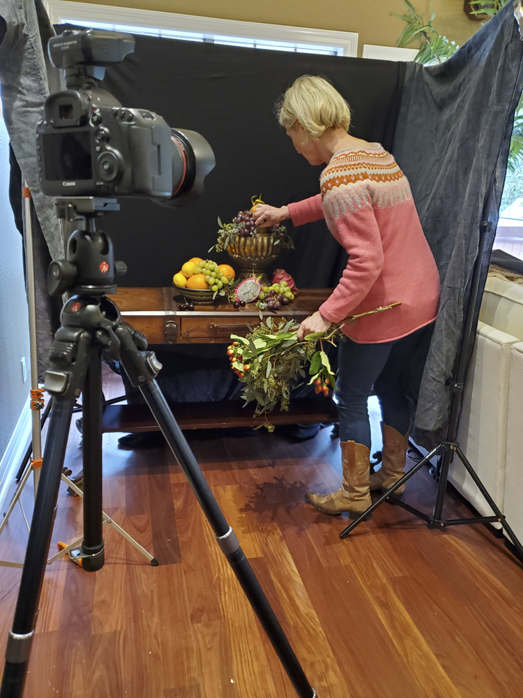 Samantha Stevens building still life Floral arrangement for photograph